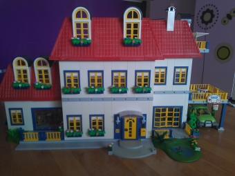 Playmobil foto's van huizen van klanten.