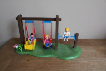 Playmobil schommel met kinderen.