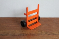 Playmobil oranje steekwagen.