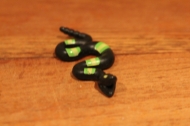Playmobil slangetje zwart met geel en groen.